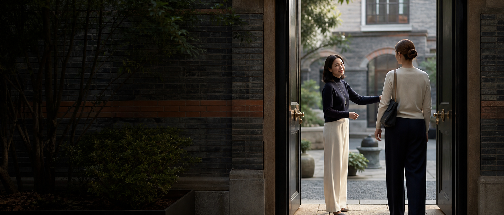 A welcoming conversation at the entrance to a Shanghai lane